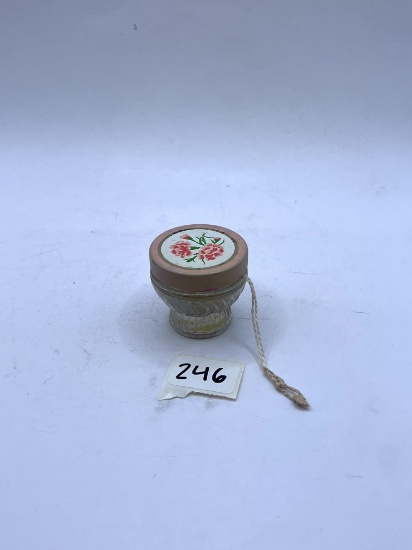 Small with pink lid Avon bottle
