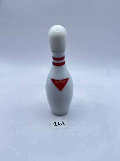 Bowling pin with some liquid Avon bottle