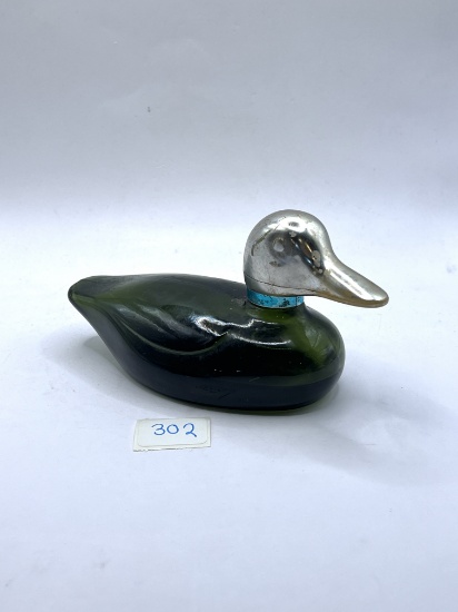 Duck with some liquid Avon bottle