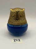 Blue and gold owl with some liquid Avon bottle
