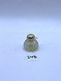 Small clear with some liquid Avon bottle