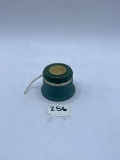 Small green Avon bottle