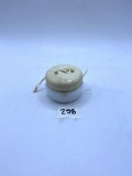 Small white Avon bottle
