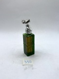 Mouse present with liquid Avon bottle