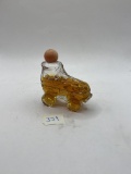 Roller skates with liqud Avon bottle