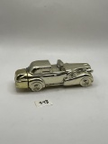 Gold car Avon bottle