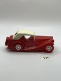 Red car with white top Avon bottle