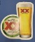 Dos Equis metal sign