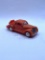 Orange car with some liquid Avon botte