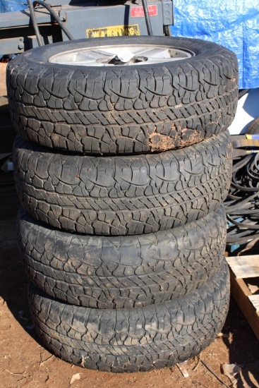 6 Lug GM Wheels - Rugged Terrain Tires