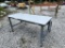 Grey Metal Table on Wheels