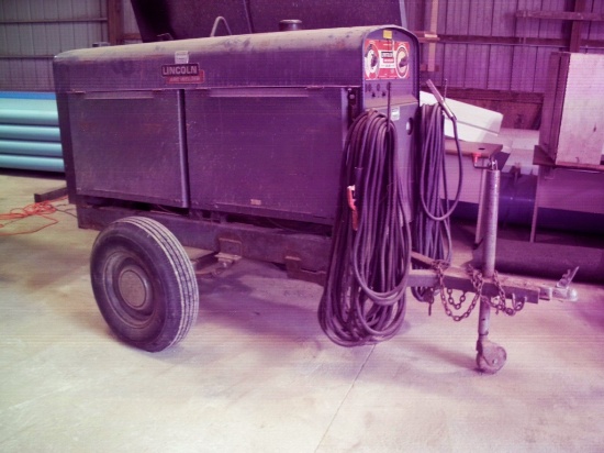 Commercial Lincoln Electric engine driven two-wheel pull type mobile Arc welder