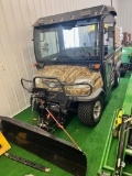 Kubota RTX900 Utility Vehicle, w/ snow plow, tonneau cover on bed, hydraulic dump bed