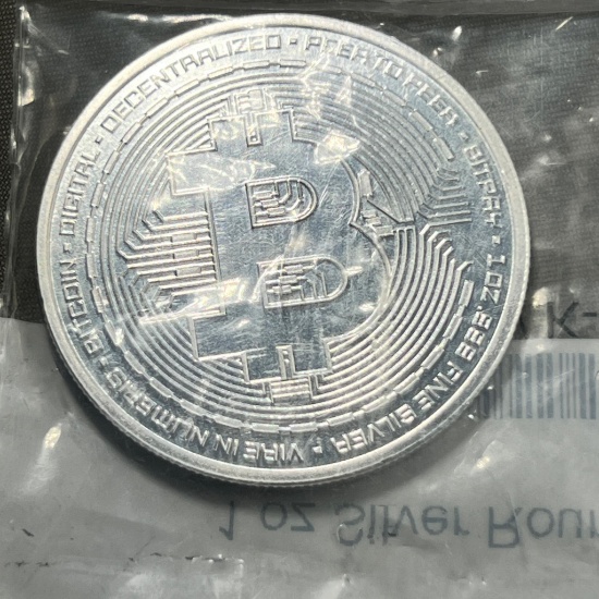 One Troy Ounce .999 Silver Round in Apmex packaging