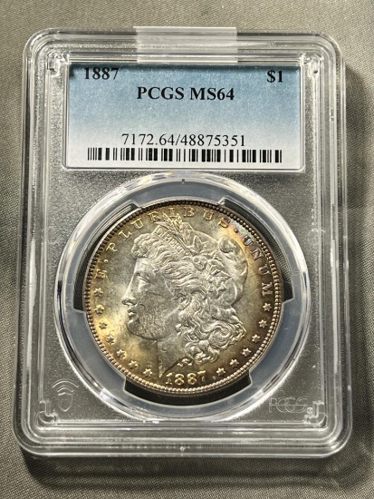 1887 Morgan Dollar in PCGS MS64 Holder