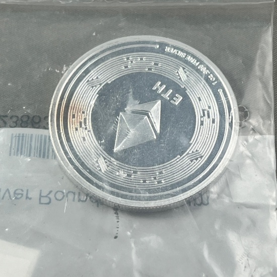 One Troy Ounce .999 Silver Round, in Apmex packaging