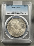 1885-O Morgan Silver Dollar in PCGS MS64 Holder