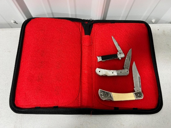 Small knife folder w/ 3 pocket knives, one is Damascus etched