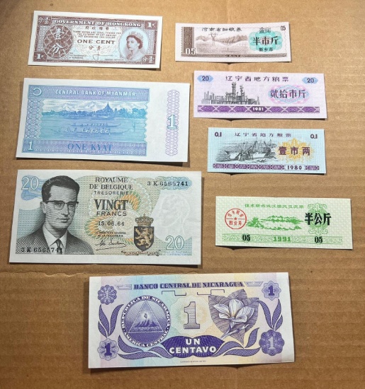7- UNC World Banknotes, Nicaragua, HongKong, Myanmar and more, Belgium note has been folded