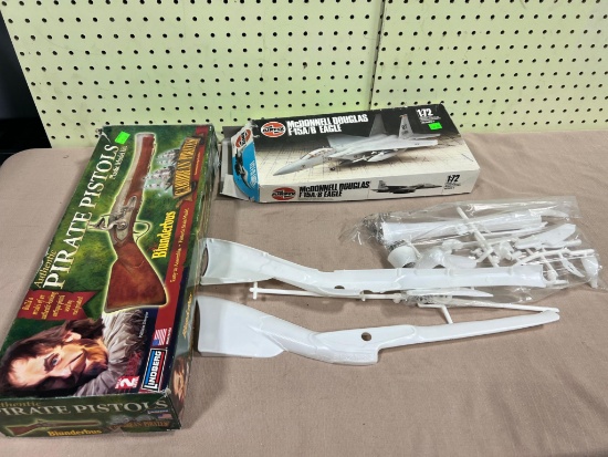 Pirate Pistols + McConnell Douglas F-15 A/B opened model kits