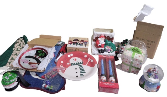 Tree skirt, Christmas plates, candles, and other Christmas items