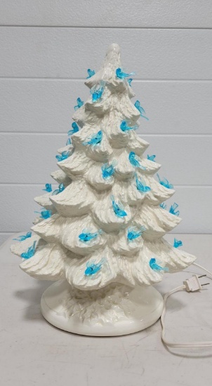 White Ceramic tree with blue birds, the very top has a chip