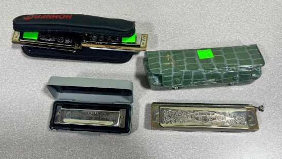 5- Hohner Harmonicas, some with cases
