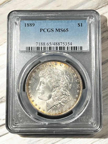 1889 Morgan Silver Dollar, 90% Silver in MS65 PCGS Holder