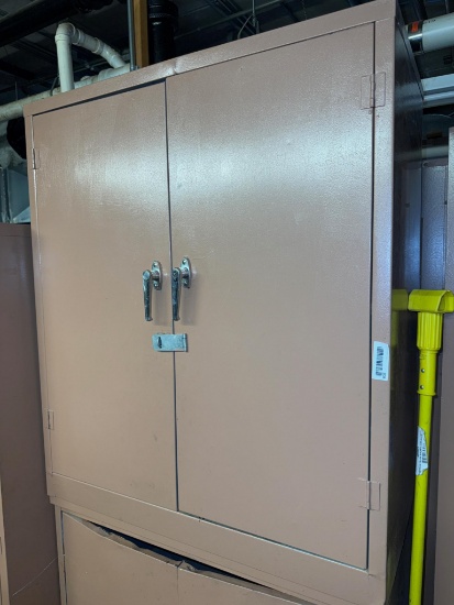 Metal cabinet 42" tall x 36" wide x 18" deep, does not include contents
