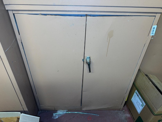 Metal cabinet 42" tall x 36" wide x 18" deep, does not include contents