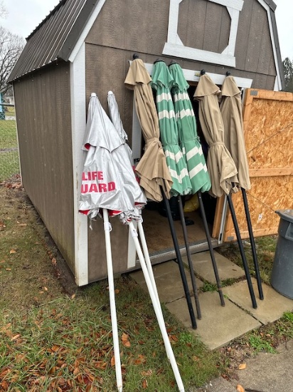 9- patio umbrellas, 3 say Lifeguard