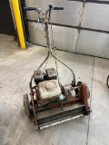 Jacobsen 22 inch reel mower, 4 HP Honda Engine, 11 blade reel, hard rubber wheels