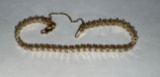 14k stamped tennis bracelet, weighs approx 8.28 grams
