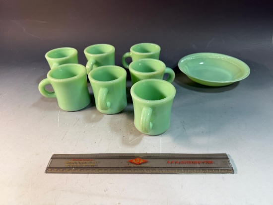 7 pieces of Fireking Jadeite, bowl is chipped, mugs show minor chips from use (flea bites)