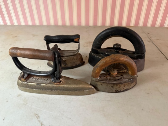 4- Sad Irons, including a nice #5 Sleeve Iron