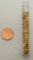 Vial of gold flake, cent for size reference not included