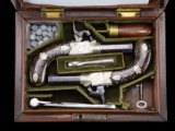 WONDERFUL CASED SET OF ORNATE PERCUSSION MUFF PISTOLS BY GREEN-LONDON.