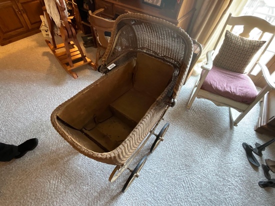 Antique wicker baby buggy
