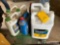 (7) containers of anti-freeze, (5) full, (2) partials