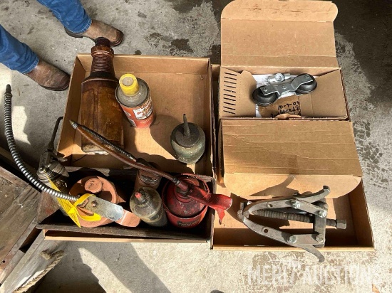 (2) flats of oil cans, gear pullers & door rollers