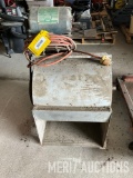 Squirrel cage fan on rolling stand with motor and cord