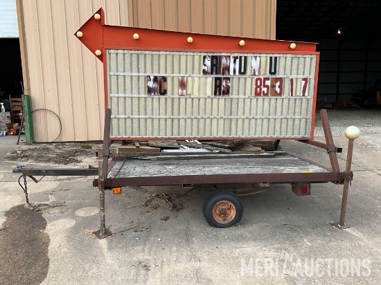 Advertising arrow sign on trailer