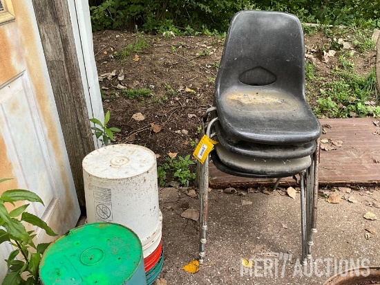 (4) Black Stackable Chairs and 5gal pails