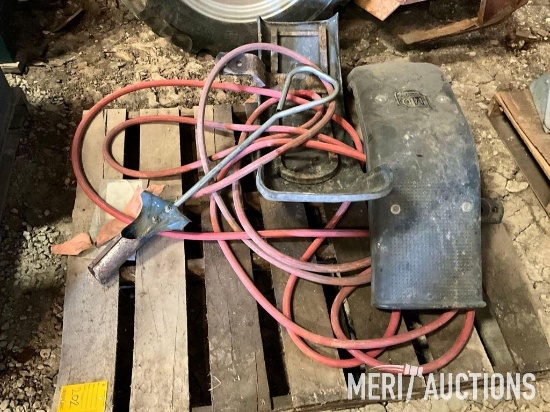 Pallet with MD Products front tractor fenders, coring tool, and garden hose