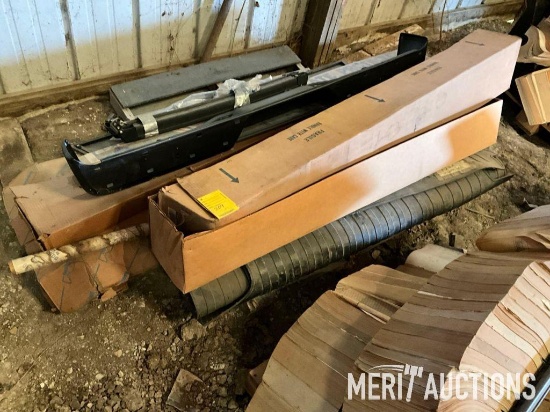 Pallet of rubber bed mats, bumpers, and other similar parts