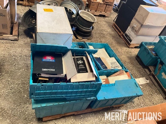 Pallet of shop manuals, bulletin manuals, and AC Delco parts