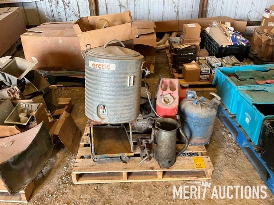 Pallet of gas cans, water cooler, parts bins