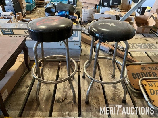 Goodwrench and Chevy bar stools, wooden coffee table, masking tape
