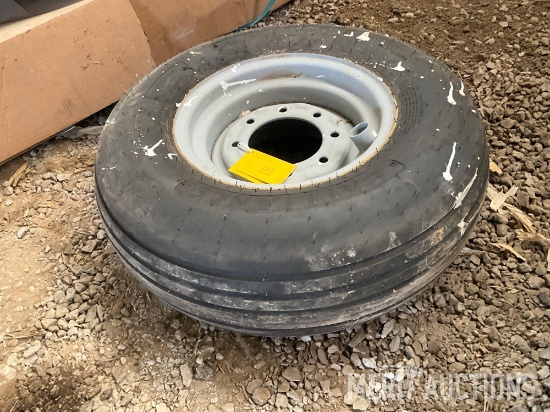 11L-15 implement tire on 8-lug rim