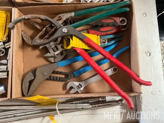 flat of various pliers and adjustable wrenches